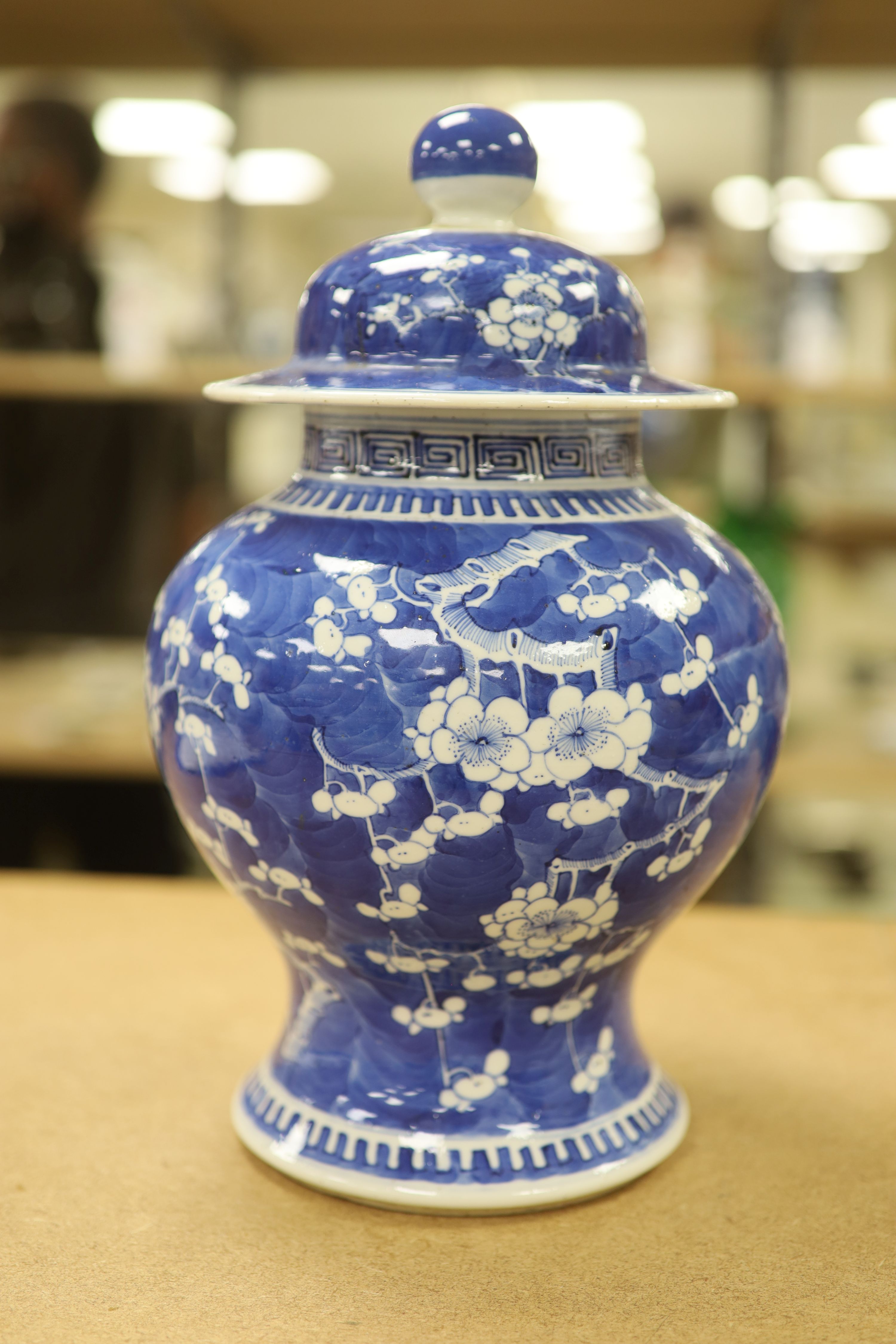 A 19th century Chinese blue and white prunus jar and cover, height, 33cm
